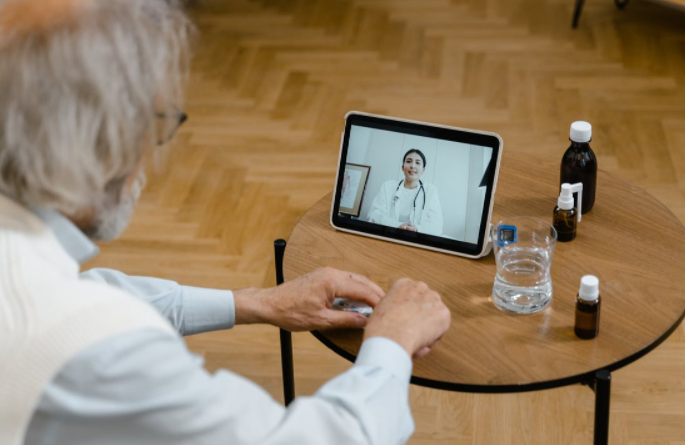 a senior with a doctor